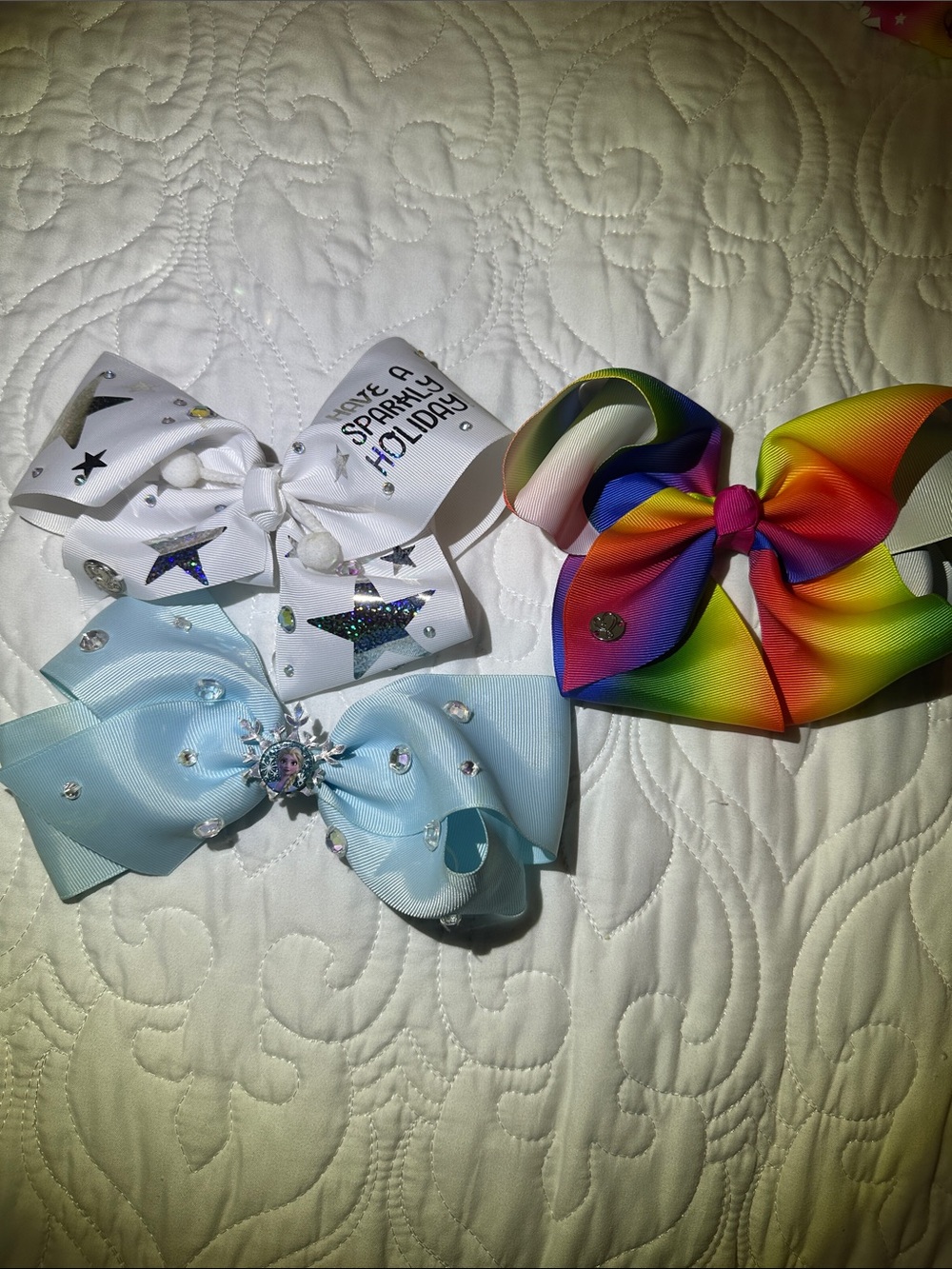 JoJo Siwa White & Rainbow hair bows.  Frozen blue hair bow..